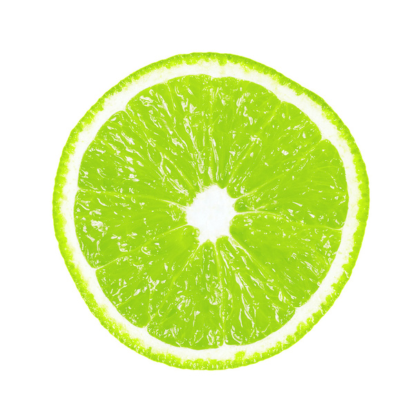 Half a lime on a white background - Фото, изображение