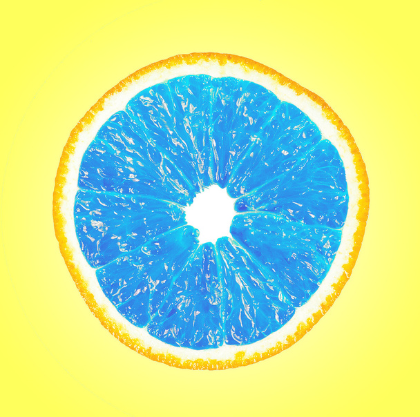 Unusual orange blue on a yellow background - Foto, Imagem