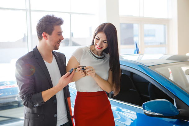 Young couple with car keys - Photo, Image