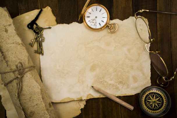 Old paper, compass, pocket watch on wooden background - Foto, Imagen
