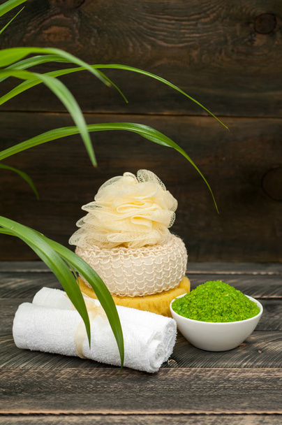 Natural green sea salt, towel and hygiene items for bath and spa - Fotó, kép