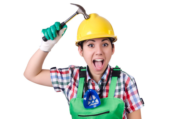 Female worker with hammer isolated on white - Foto, afbeelding