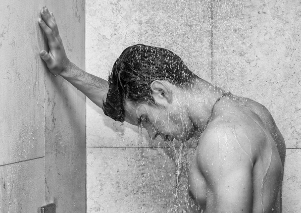 Attractive Young Muscular Man Taking Shower - Photo, image