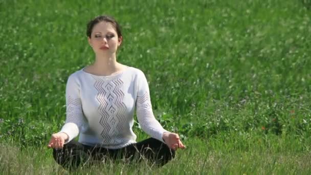 Girl Sits In The Lotus Position - Footage, Video