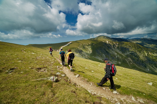 hikers walking on a trail - Foto, imagen