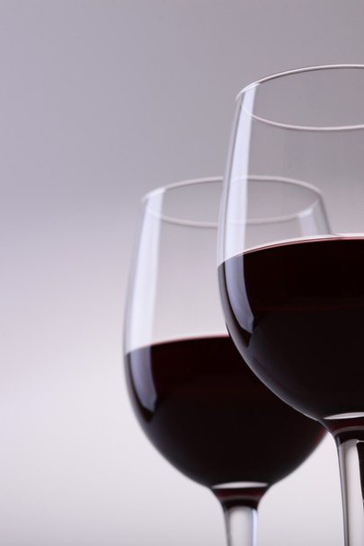 Closeup of two glasses with red wine  - Zdjęcie, obraz
