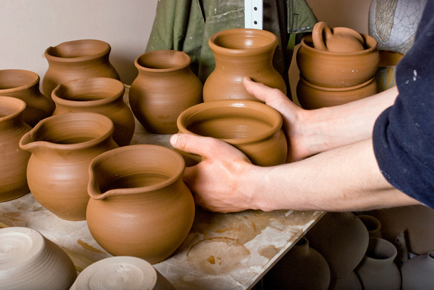 Hands of a potter, creating an earthen jar - Photo, Image