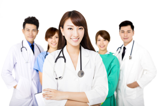 smiling Medical team standing together isolated on white - Fotografie, Obrázek