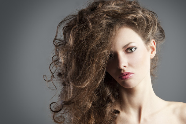 Pretty girl with great hair style. she is in foregound - Fotografie, Obrázek