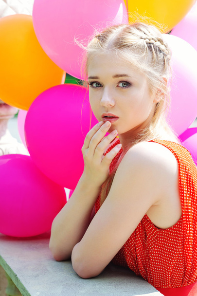 Closeup portrait of tender teenager with balloons - Foto, Bild