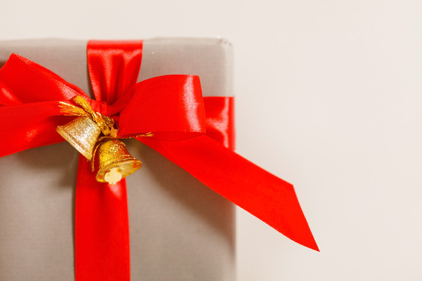 Christmas presents with red bow - Фото, зображення