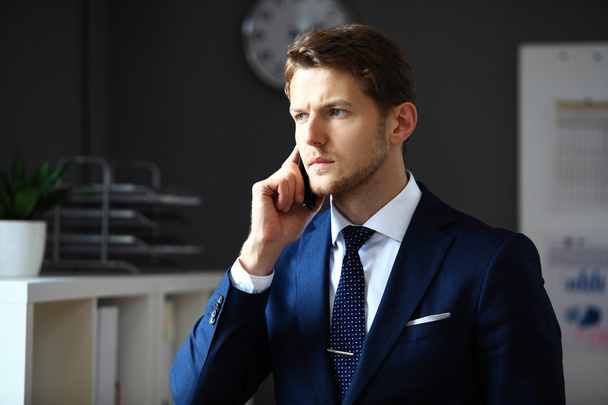 businessman  speaking on the phone - Foto, Bild
