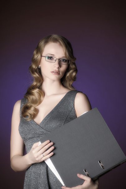 Attractive blonde secretary in a gray dress - Fotoğraf, Görsel