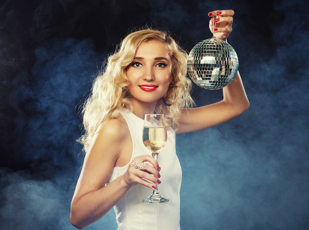  beautiful woman in evening dress with wine and disco ball - Zdjęcie, obraz