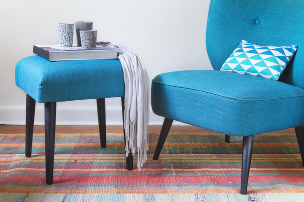 Teal retro armchair and ottoman with decor objects horizontal - Photo, Image