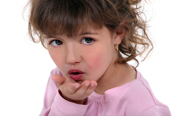 Little girl blowing kiss - Photo, Image