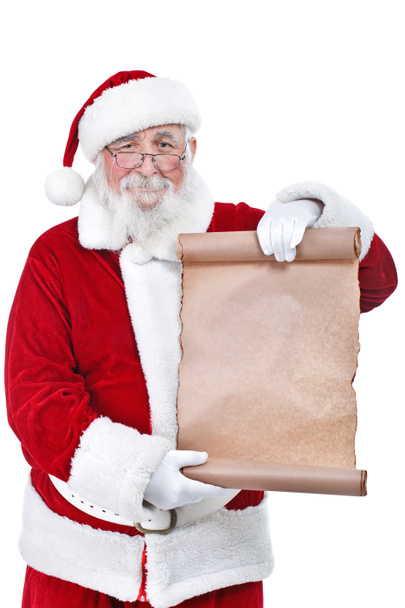 Santa holding blank scroll list - Foto, Imagem