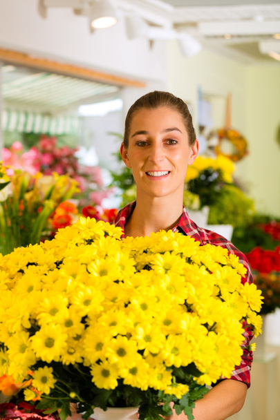 Nainen kukkakauppa kukkakauppa
 - Valokuva, kuva
