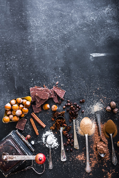 Sweet spices  and chocolate on a table  - Foto, afbeelding