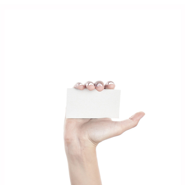 Blank business card in a female hand. Concept - Photo, image