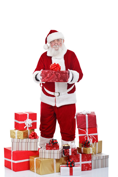 Santa Claus with many presents - Φωτογραφία, εικόνα