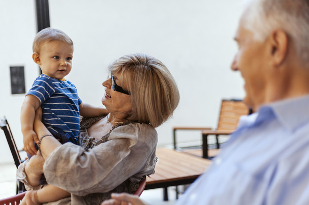 Grandparents With Their Grandson At Cafe - Foto, Imagen