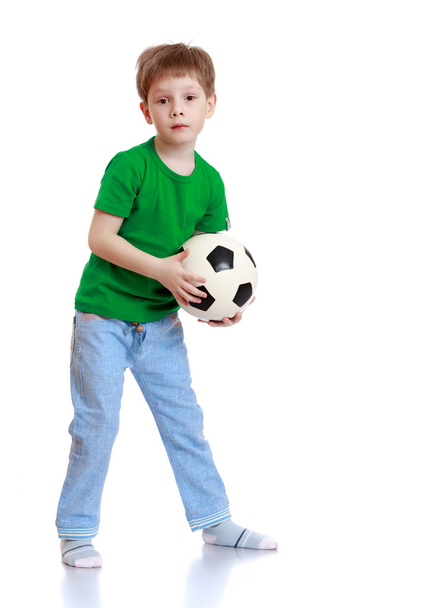 Little boy playing with a fire ball - Fotó, kép