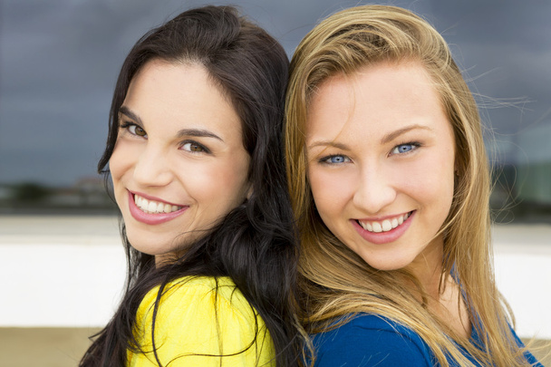 two young girls smiling - Фото, изображение