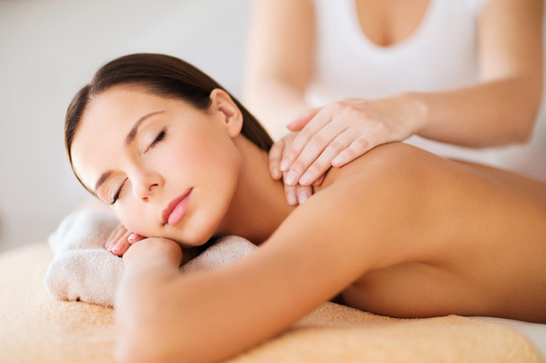 beautiful woman in spa having massage - Photo, image