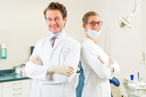 Dentists in their surgery - 写真・画像