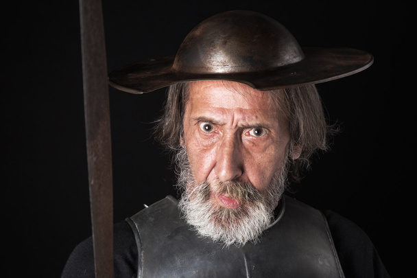 Old bearded man with breastplate and helmet - Photo, Image
