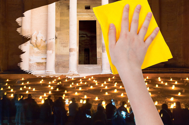 рука удаляет ночной вид Мбаппе желтой тряпкой
 - Фото, изображение