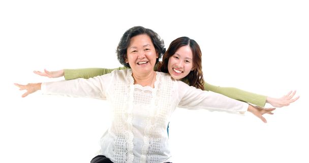 Asian senior woman and daughter - Фото, зображення