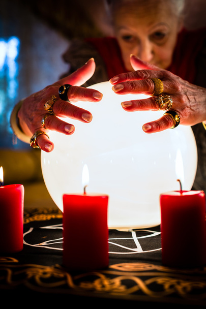 Soothsayer during a Seance or session with Crystal ball - Photo, Image