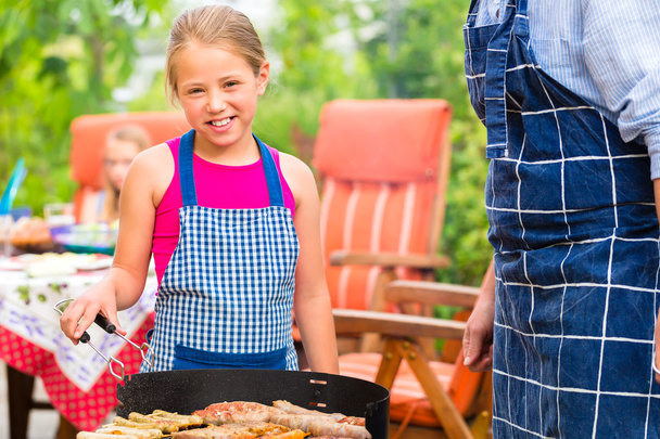Barbecue with family in the garden - Фото, изображение