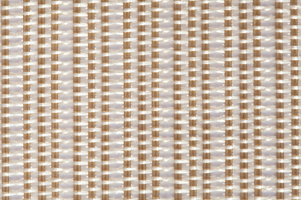 white and beige mat with interlinking stitches and vertical lines - Fotografie, Obrázek