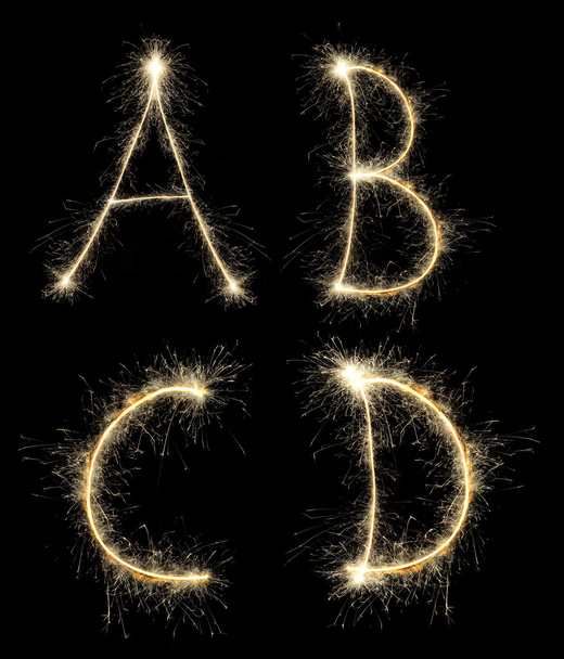 alfabeto de Natal criou um sparkler
 - Foto, Imagem