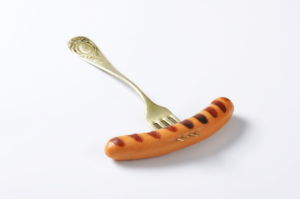 Grilled sausage on fork - Photo, Image