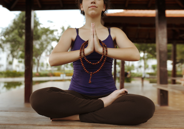 Meditating woman with rosary - Photo, Image