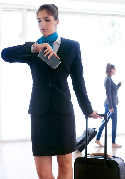 Beautiful hostess working in airport. - Foto, imagen