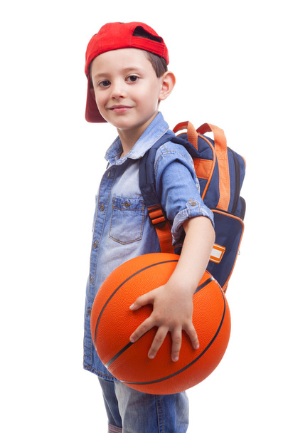 school kid holding a basketball - Фото, изображение