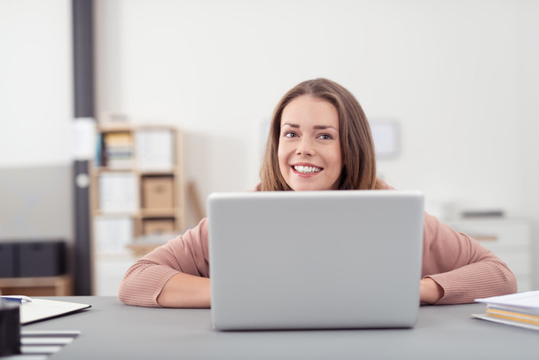 Happy Young Office Woman with Laptop at the Table - Фото, изображение