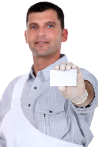 Painter with blank business card - Фото, изображение