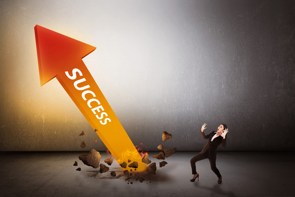 business woman surprise looking arrow of success out from bottom - Foto, Imagem