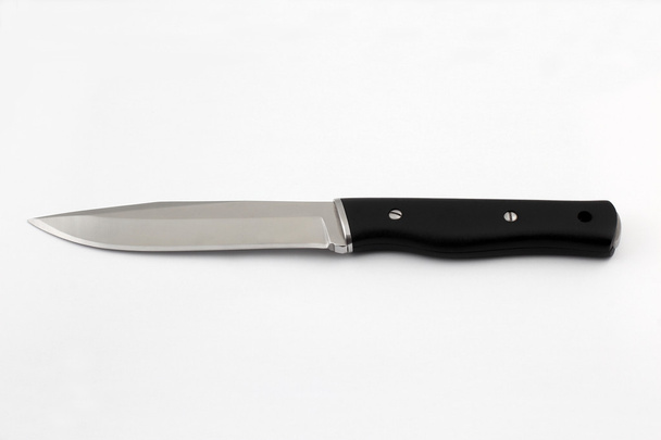un cuchillo con mango negro de Micarta
  - Foto, imagen