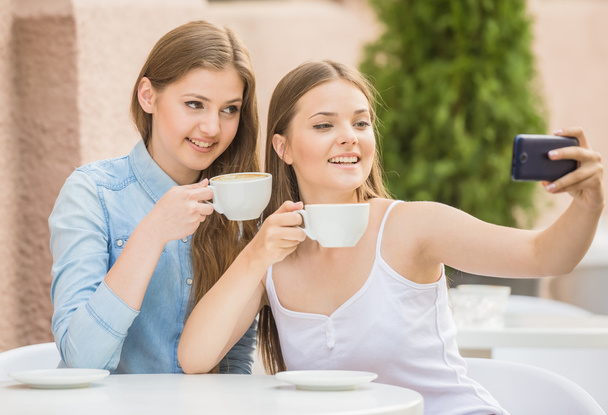 Girls in summer cafe - Foto, Imagen