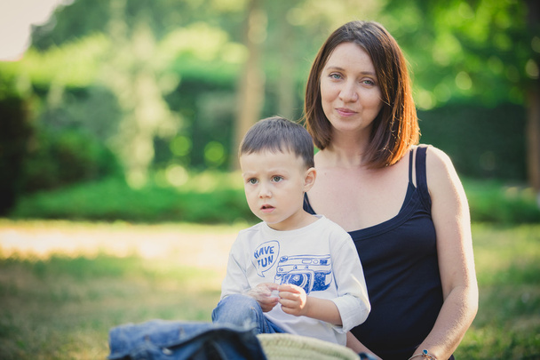 Mother and son in the park summer day. - Foto, Bild