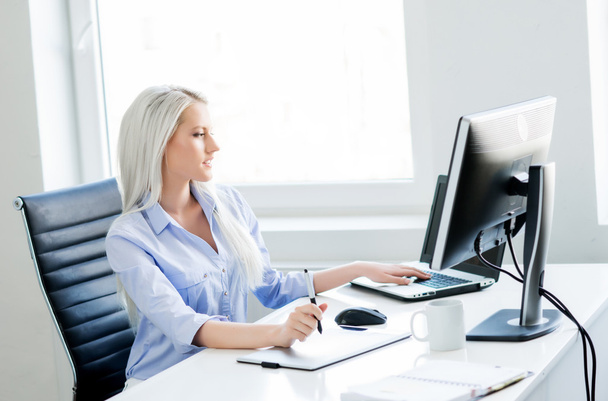confident woman working in office - Photo, image