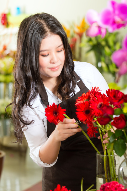 Vendedora em uma florista
 - Foto, Imagem