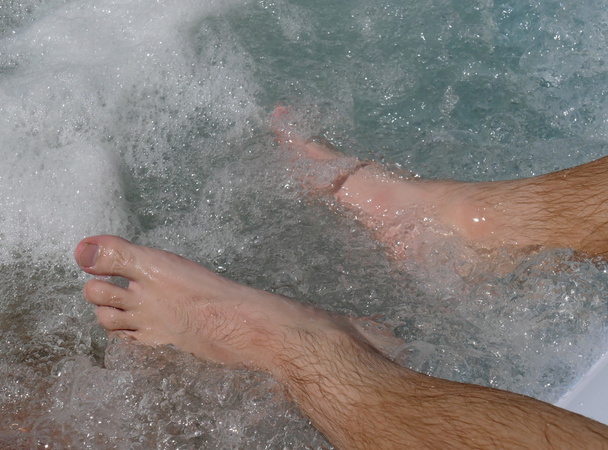 Feet in Jacuzzi hot tub - Photo, Image